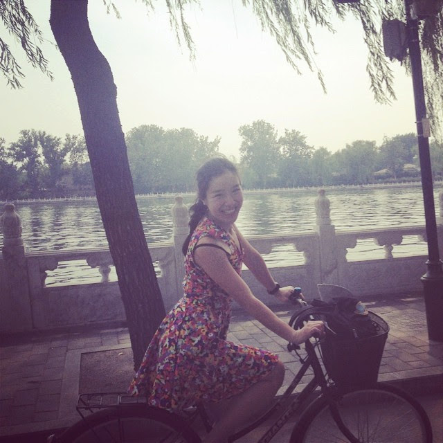 circle skirt dress on a bicycle